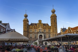 Restaurant and the historic town hall on the market in Venlo, the Netherlands
