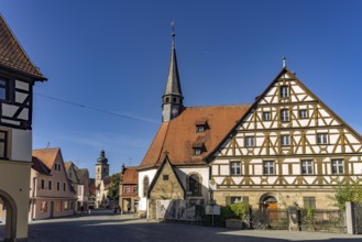 Half-timbered house and the Roman Catholic hospital church of St. Katharina in Forchheim, Upper