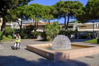 Pedestrian zone, fountain in the Marchesan park, Grado, Julian Friuli, Adriatic Sea, Italy