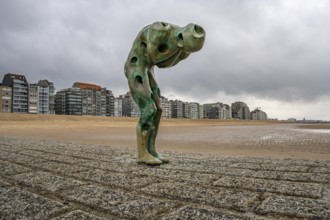 Art on the North Sea beach, in Knokke-Heist, Tomorrow Man by Cathérine François, is washed over by
