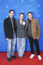 Hang Chong, Michelle Yeoh and Sean Baker in front of the premiere of the film Everything Everywhere