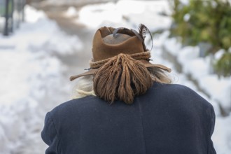 Elderly man with braided braid wrapped around his traditional hat, Nuremberg, Middle Franconia,