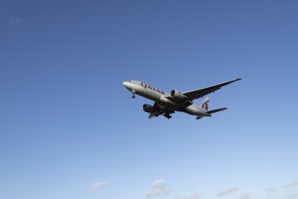 Boeing 777 A7-BFL commercial jet aircraft of Qatar cargo in flight on approach to land at London