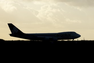 Boeing 747-400 jumbo jet LX-TCV commercial aircraft of Cargolux cargo waiting to take off