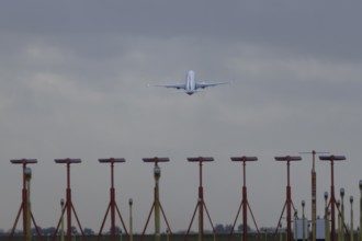 Boeing 737 commercial passenger airliner jet aircraft taking off in flight at London Stansted