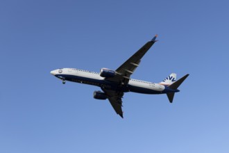 Boeing 737 commercial passenger airliner jet aircraft of SunExpress airways in flight on approach