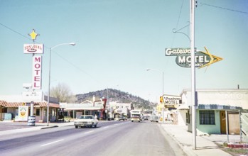 Motels line roadside on Route 66 road in centre of Williams, Arizona, USA 1976