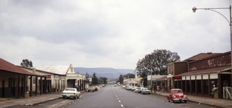 Typical road running through Main Street of country town with shops lining the roadside, South