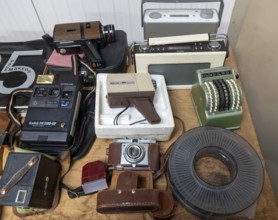 Display of film cameras, cine camera, transistor radios and other types of old analogue technology,
