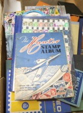 Stamps albums and stamp collection assembled in box, 1950s album with picture of Hawker Hunter RAF