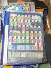 Stamp album collection page of Queen Elizabeth II Machin decimal definitive stamps, both mint and