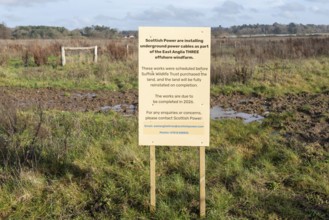 Scottish Power East Anglia Three offshore windfarm sign for work at Martlesham Wilds, Suffolk,