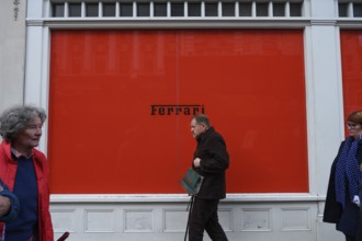 London, UK. January 29th 2025. Red hoarding surrounding the new Ferrari boutique selling replica