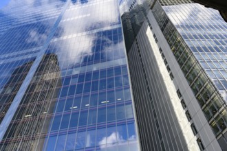 Modern abstract reflections in glass fronted commercial office buildings in the financial district