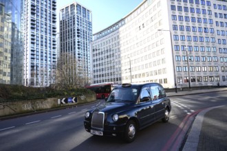 London, UK. January 31st 2025. A typical London black cab driving near Waterloo Station on the