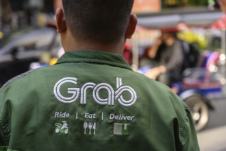 Bangkok, Thailand. March 25th 2025. A Grab food delivery service logo displayed on the shirt of a