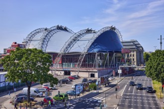 Musical Dome, large tent, road, general architecture, road markings lanes and stop line, cars,