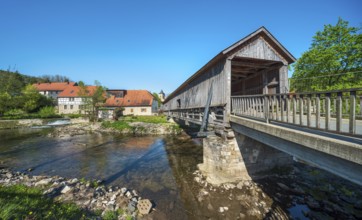 Covered wooden bridge from 1818 and historic water mill on the Ilm river, Buchfart, Weimarer Land,