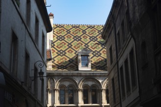 Dijon, France. September 19th 2024 Polychrome tiles and the elegant architecture of Dijon, a city