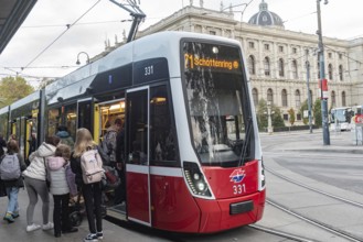 Vienna, Austria October 14th 2024 Passengers boarding 71 Tram the first district Innere Stadt, near