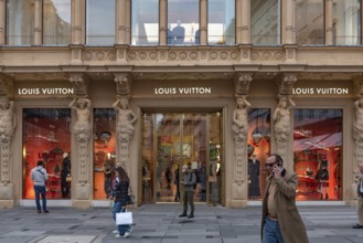 Vienna, Austria. October 15th 2024 Shopper in a busy fashionable shopping street in the centre of