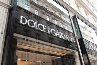 Vienna, Austria. October 15th 2024 Dolce and Gabba brand sign on a store front selling luxury