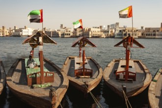 Dubai, United Arab Emirates. July 1st 2019 Traditional local water taxis moored at the harbour of