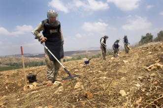 Tyre, Lebanon. July 15th 2010 A team from The Mines Advisory Group (MAG) clearing unexploded