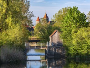 The river Altmühl in the Altmühl valley, behind the medieval towers of Ornbau, Middle Franconia,