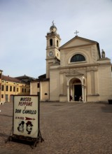 Brescello, note about the Don Camillo and Peppone museum in front of the church of Santa Maria