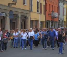 Group of visitors in the town of Don Camillo and Peppone, Brescello, Emilia-Romagna, Italy