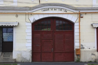Municipality of Cristian, German Grossau, gate in the town center with the lettering, Undank is