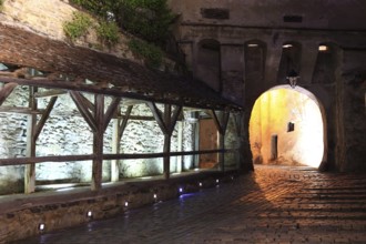 Romania, the way through the hour tower at blue hour in the historic old town of Sighisoara, German