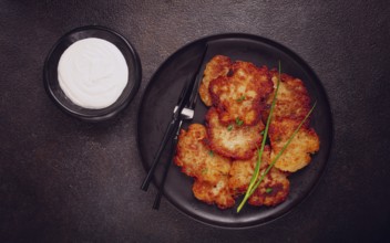 Potato pancakes, pancakes with sour cream, Belarusian dish, homemade, no people
