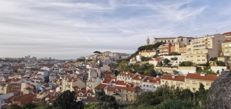 Panoramic view of Lisbon, a city with red roofs and buildings on a hill, Lisbon, Portugal