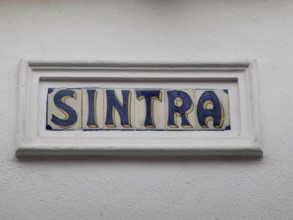 Sign with the lettering 'Sintra' on artfully painted tiles, Sintra Cascais nature park Park,