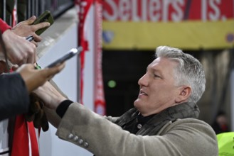 TV expert Bastian Schweinsteiger, portrait, signing autographs, soccer Bundesliga, DFB-Pokal,