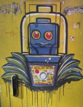 Colour-intensive graffiti of a stylized robot on a yellow background, Albania