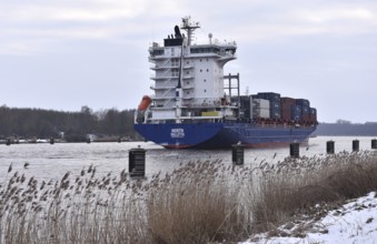 Container ship NORTH sails through the Kiel Canal, NOK, Kiel Canal, Schleswig-Holstein, Germany in
