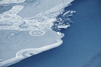 Abstract patterns in the ice of the partly frozen Königssee, detailed view, Berchtesgaden National