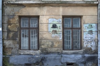 Wall painting at a former Jewish hat shop in the Jewish Quarter in Lemberg, Ukraine