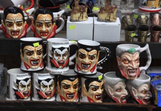 Souvenir sale at Bran Castle, marketing of Dracula, printed here on cups, Törzburg, in