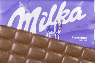 Milka chocolate bar Alpine milk chocolates with logo in Stuttgart, Germany