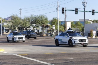 Waymo self-driving autonomous vehicles driverless cars from Google and Jaguar Robotaxi in Phoenix,