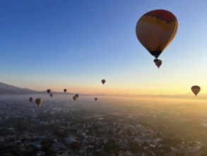 Panoramic aerial view of Mexico Teotihuacan pyramids. Hot air balloons flying over the Mexican