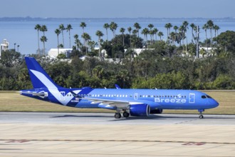 An Airbus A220-300 Breeze Airways aircraft with license plate N239BZ at Tampa airport, USA