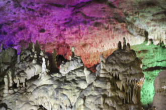 Bärenhöhle, Karlshöhle, Erpfinger Höhle, white Jurassic limestone rock, coloured light, colorful