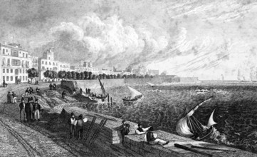 Waterfront of Cadiz, Cadiz province, Spain, Atlantic Ocean, walkers, wall, row of houses, stormy