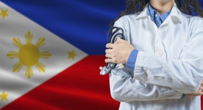 Healthcare professional with Philippines flag background. Professional doctor holding stethoscope