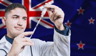 Doctor holding syringe on New Zealand flag background. Medical professional holding syringe with